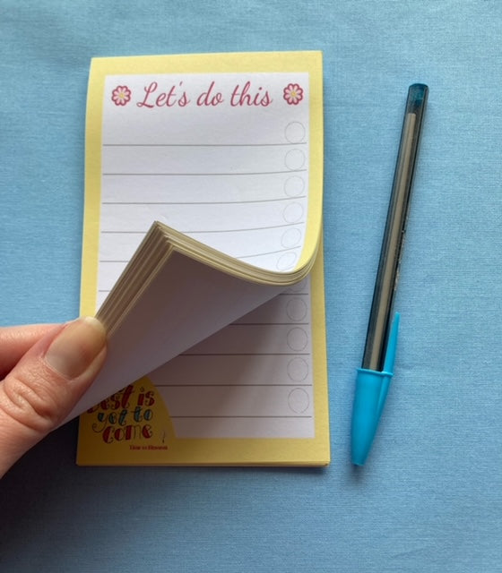 photo to show pages of the yellow to do list, with pen next to it