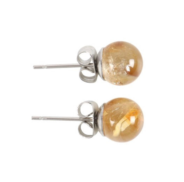 close up photo of citrine earrings