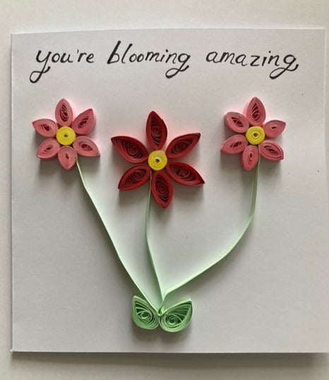 Handmade quilled flower card, that reads you're blooming amazing