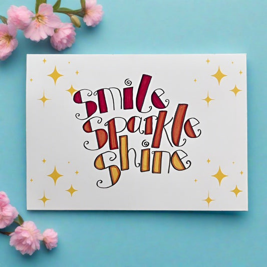 Positive postcard with stars and bright writing that reads - smile sparkle shine